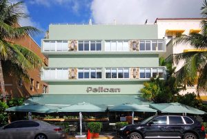 Image of pelican cafe with green exterior and blue skys