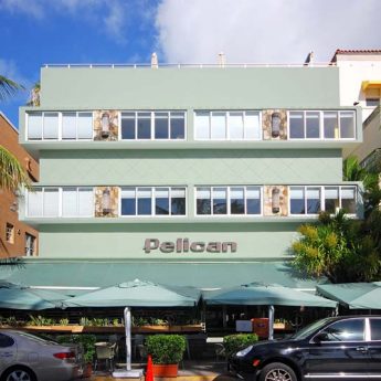 Image of pelican cafe with green exterior and blue skys