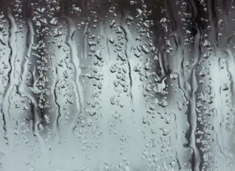 window with rain, hurricane outside